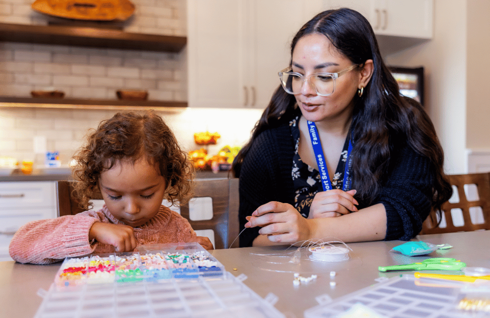 Little girl with family services support worker