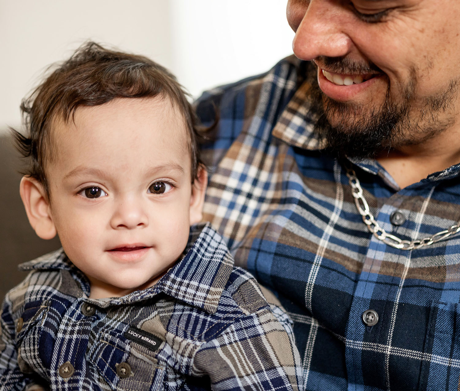 father smiling at son